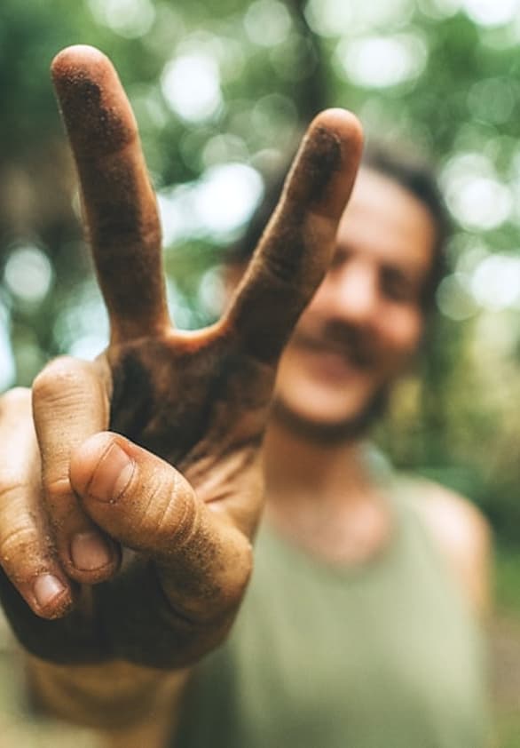 Person making peace sign